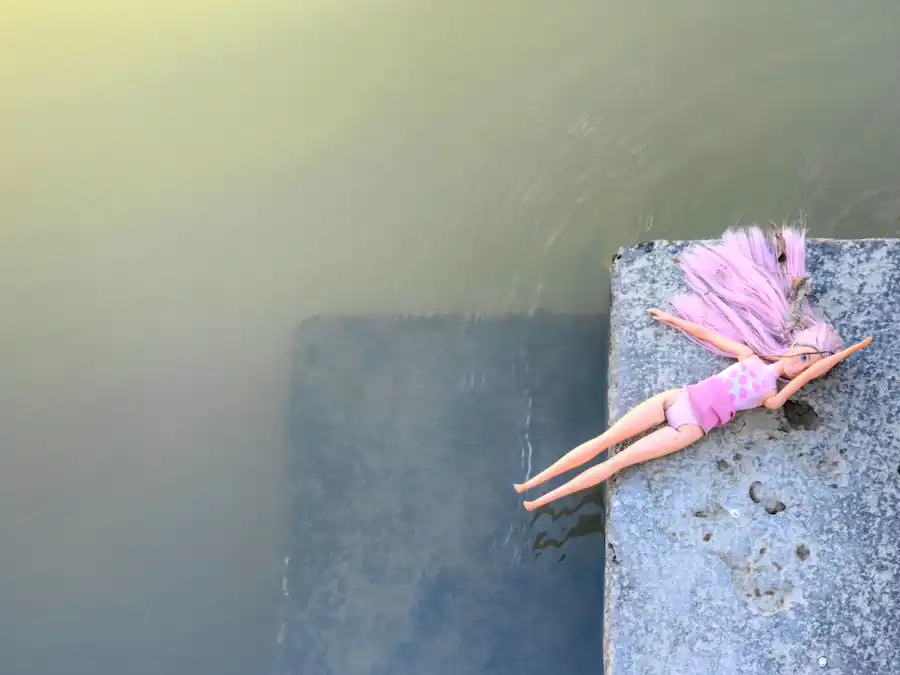 Sunbathing Barbie on the banks of the Tiber